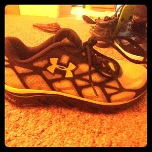 Lime green and black under armour shoes size 10